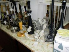 A large quantity of table lamps & switches etc