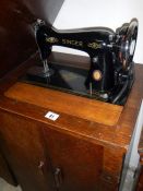 A Singer cabinet sewing machine