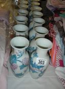 A quantity of blue & white vases