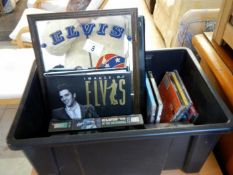 A quantity of Elvis books, mirror & CD's etc.