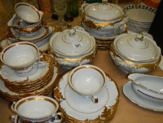 A gilded dinner set