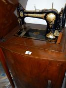 A Jones cabinet sewing machine