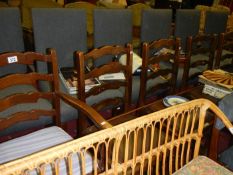 A set of 5 ladder back chairs