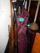 A large quantity of fishing rods & bank sticks etc