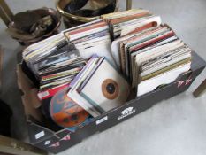 A box of assorted 1960/70/80's 45 rpm records