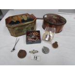 2 vintage tins and contents including badges, pins,