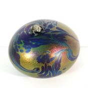 A glass form art glass paperweight with one frog,