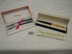 A boxed Parker 51 pen with rolled gold lid and a boxed Platinum pen set