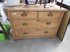 A 2 over 2 pine chest of drawers