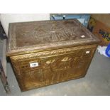 A large brass log box