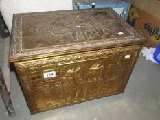 A large brass log box