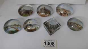 7 souvenir paperweights