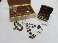 A mixed lot of costume jewellery including silver rings,