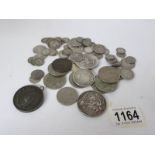 A mixed lot of coins including silver