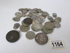 A mixed lot of coins including silver