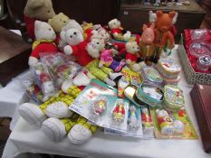A quantity of Rupert bear soft toys etc