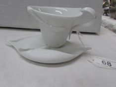 A bone china tea cup and saucer by Franz