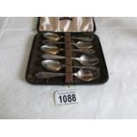 A cased set of 6 silver tea spoons,