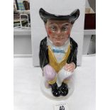 A 19th century Staffordshire Toby jug (has scuffs to right arm)