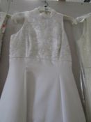 An Alfred Angelo wedding gown with fitted beaded bodice and lovely skirt flowing in to back train,