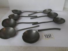 8 antique pewter spoons,