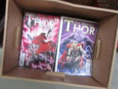 A box of 'The Mighty Thor' comics