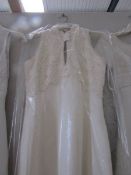 A Helen Michael of London ivory wedding dress with lace overlay bodice, slim fit,