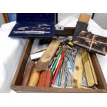 A mixed lot of various drawing instruments including boxwood and brass rulers