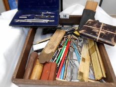 A mixed lot of various drawing instruments including boxwood and brass rulers