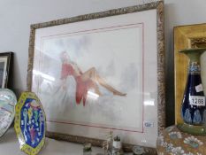 A framed and glazed semi nude print