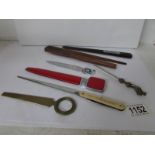 A collection of paper knives including Jutland 1916 and HMS Snapdragon examples