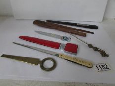 A collection of paper knives including Jutland 1916 and HMS Snapdragon examples