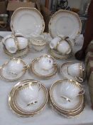 A Royal Chelsea gold decorated bone china 22 pieces tea set