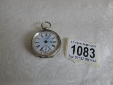 A ladies silver fob watch with enamel dial,