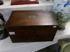 A mahogany stationery box
