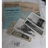 A mixed lot of WW2 military ephemera including Tobruk bombing photographs, 1941 newspaper article,