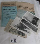 A mixed lot of WW2 military ephemera including Tobruk bombing photographs, 1941 newspaper article,