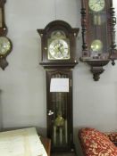A Hermle triple chime Grandfather clock,