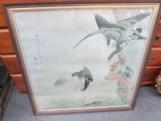 A large framed Japanese print of geese in flight signed Maruyana Okyu