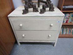 A painted 2 drawer chest