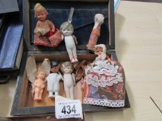 A collection of dolls house miniature dolls