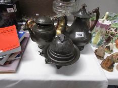 A pewter tea pot,