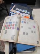Several albums of world stamps etc