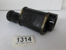 A WW2 British Army officer's Bino Prism monocular sighting scope