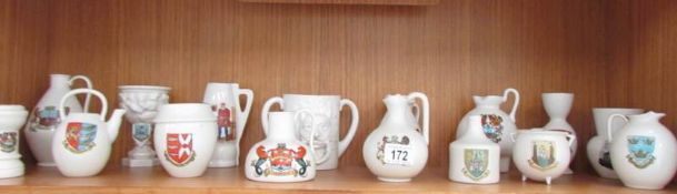 16 pieces of Goss crested china including Blackpool tankard featuring ghoul door knocker,