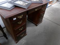 A mahogany double pedestal desk
