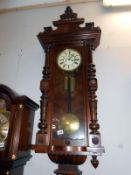 A Viennese double weight regulator wall clock