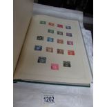 An album of GB stamps,