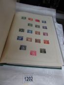 An album of GB stamps,