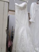 A vintage wedding dress with long train
